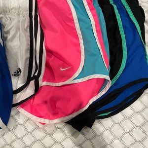 4 pairs of Adidas and Nike running sorts